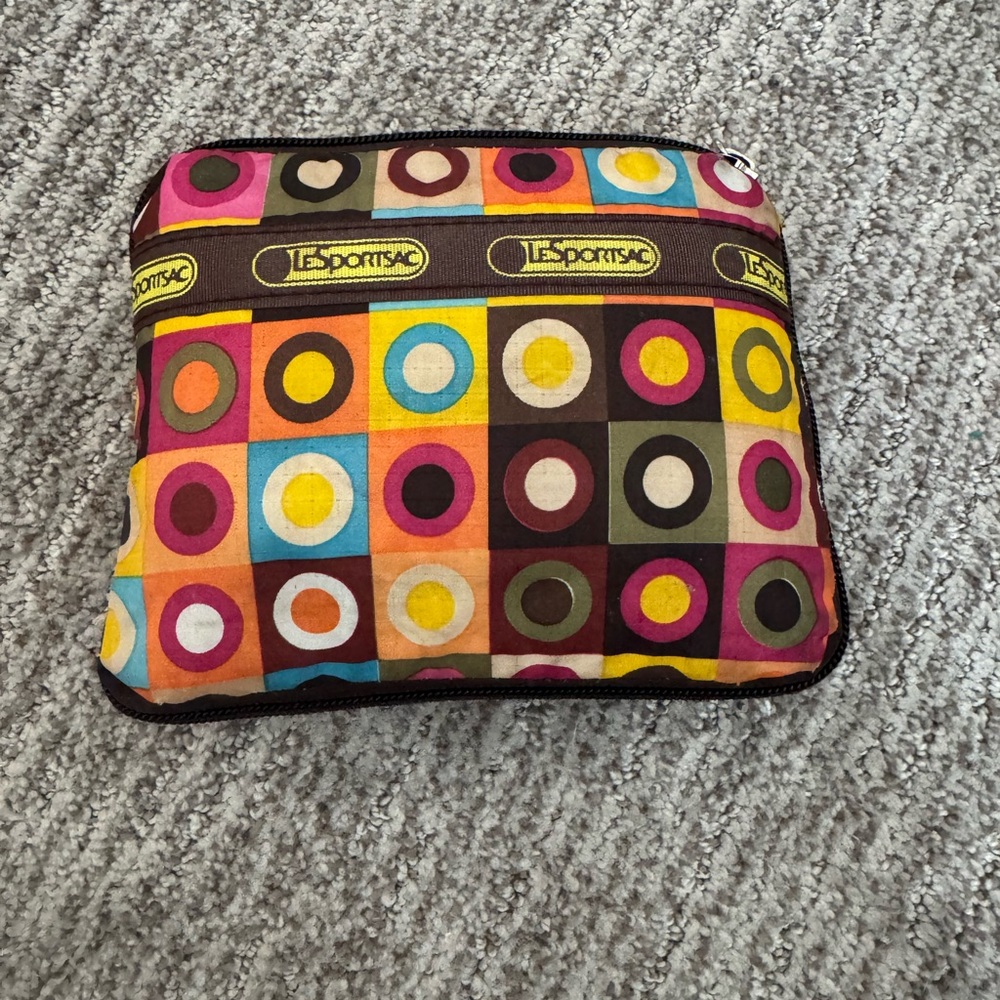 Le sport sac tote. This is easily foldable into a zippered pouch.